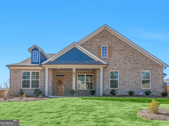 view of front of property featuring a front lawn