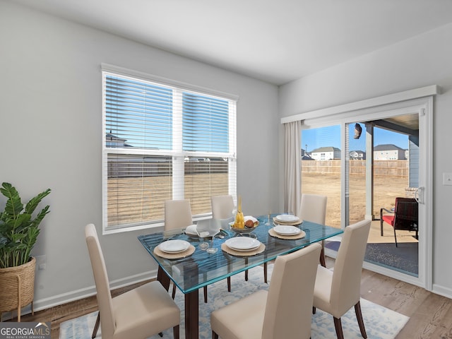 dining area featuring hardwood / wood-style floors