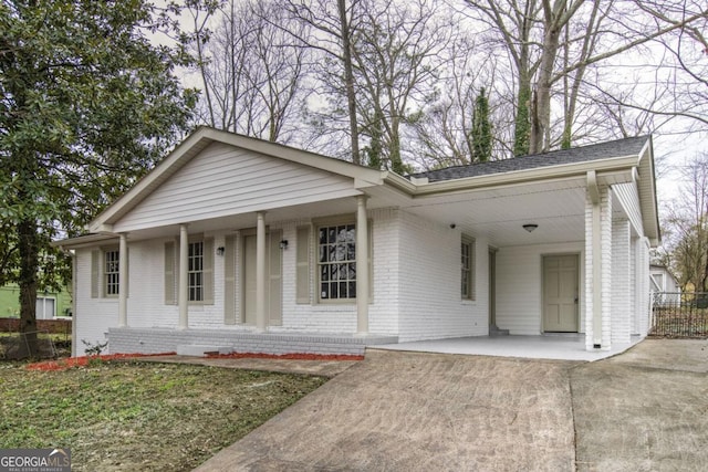 single story home with a carport