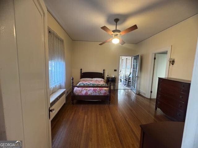 bedroom featuring wood-type flooring and ceiling fan