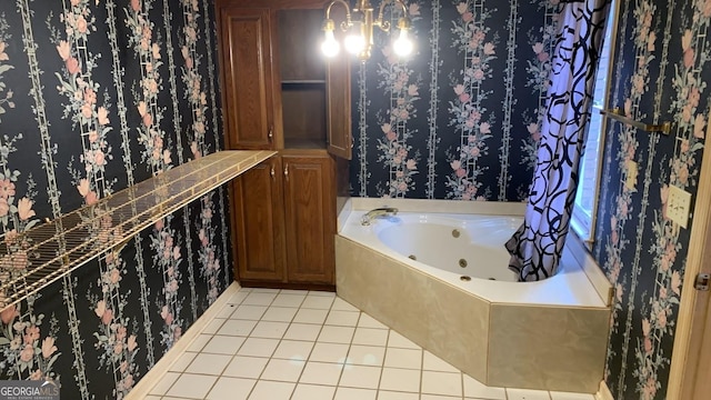 bathroom featuring tile patterned flooring and a bathtub