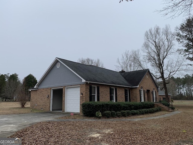 view of home's exterior with a garage