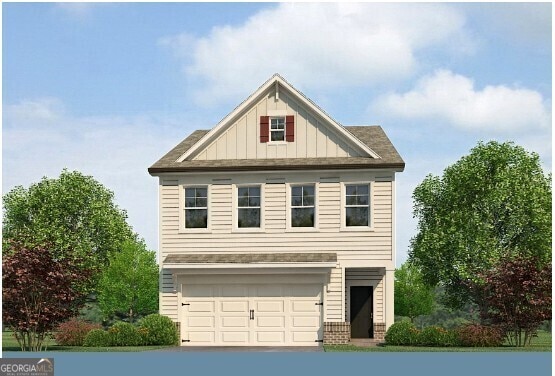 view of front of property featuring a garage