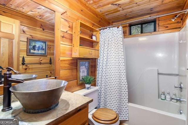 full bathroom featuring toilet, sink, wooden ceiling, and shower / bath combo with shower curtain