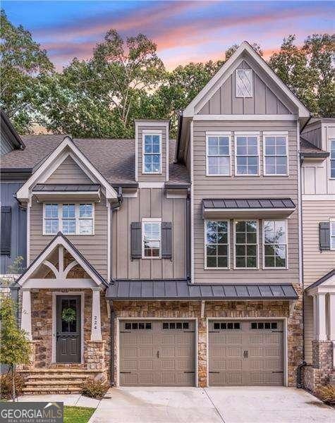 view of front of property with a garage