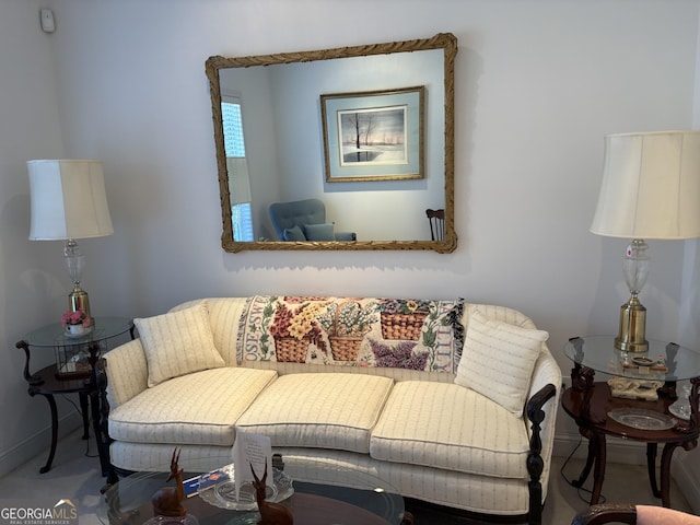 living room featuring baseboards