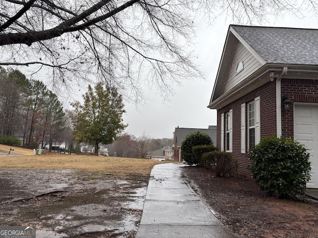 view of home's exterior with a garage