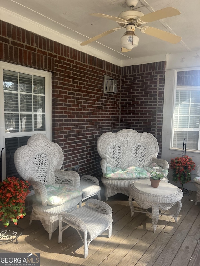 wooden deck with ceiling fan