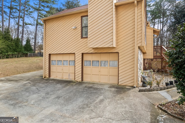 view of home's exterior with a garage