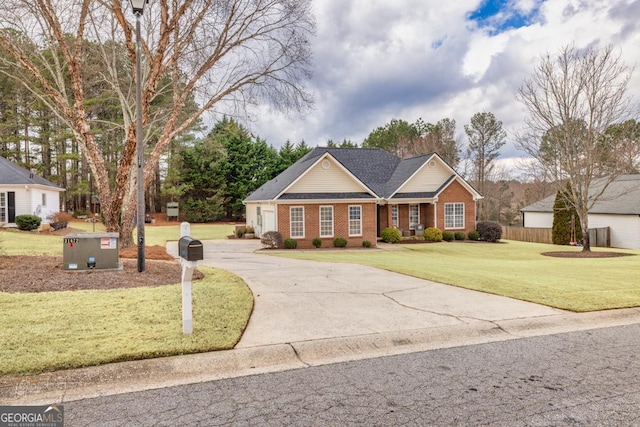 single story home featuring a front lawn