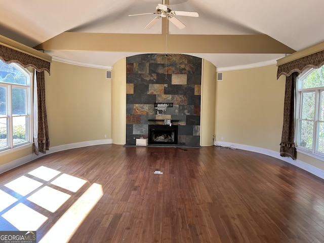 unfurnished living room with wood-type flooring, lofted ceiling, and ornamental molding