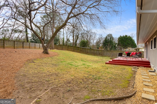 view of yard featuring a deck