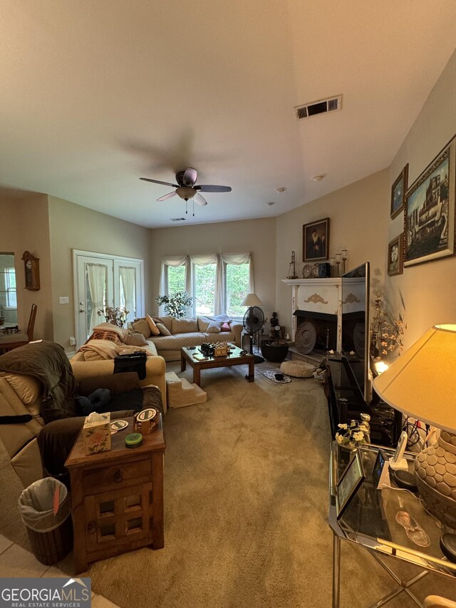 4230 Joe Stephens Rd, Franklin, GA 30217 - living area with a ceiling fan, a fireplace, and carpet floors