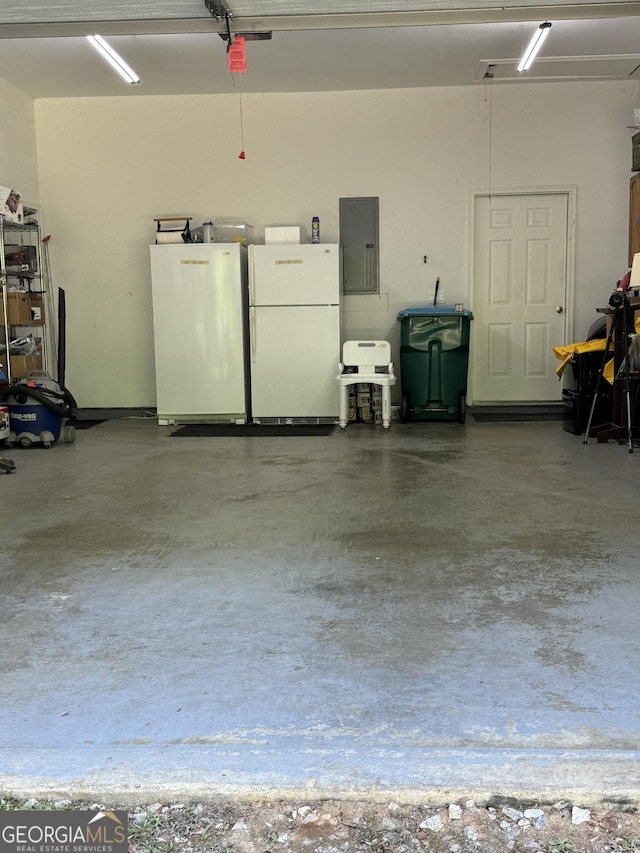 4230 Joe Stephens Rd, Franklin, GA 30217 - garage featuring freestanding refrigerator, refrigerator, and electric panel