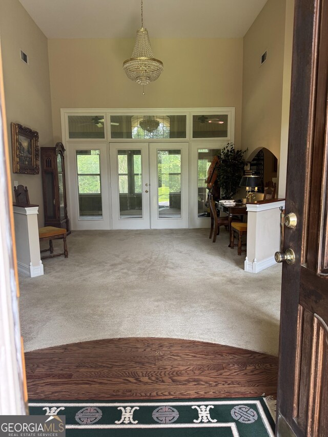 4230 Joe Stephens Rd, Franklin, GA 30217 - carpeted entrance foyer with a chandelier