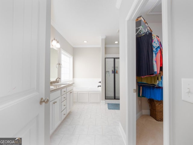 bathroom with vanity, crown molding, tile patterned floors, and independent shower and bath
