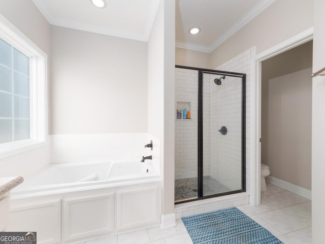 bathroom with tile patterned flooring, crown molding, shower with separate bathtub, and toilet