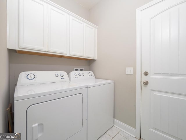 laundry area with cabinets and washer and dryer
