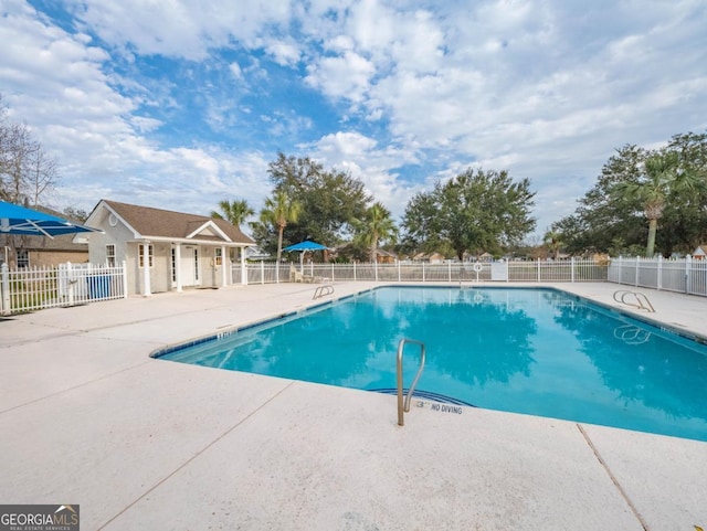 view of pool with a patio