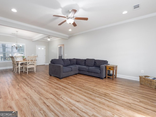 living room featuring crown molding, ceiling fan with notable chandelier, and light hardwood / wood-style floors