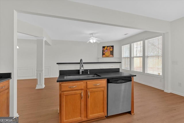 kitchen featuring sink, light hardwood / wood-style flooring, dishwasher, and ceiling fan