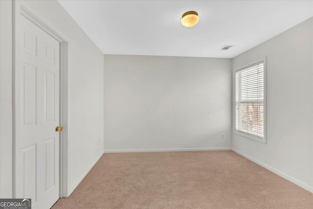 view of carpeted spare room