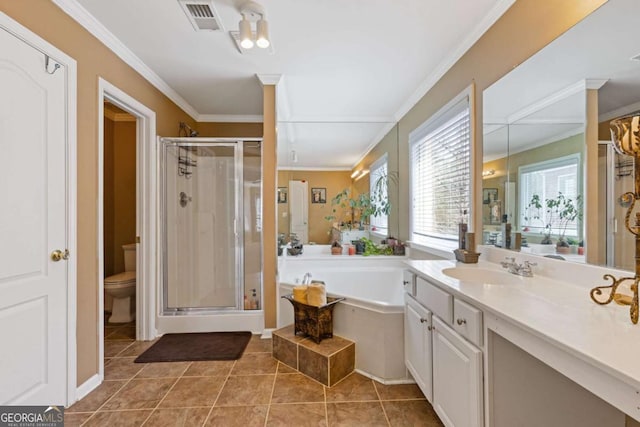 full bathroom with crown molding, vanity, tile patterned floors, independent shower and bath, and toilet