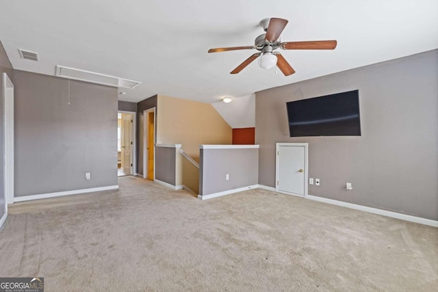 carpeted empty room featuring ceiling fan