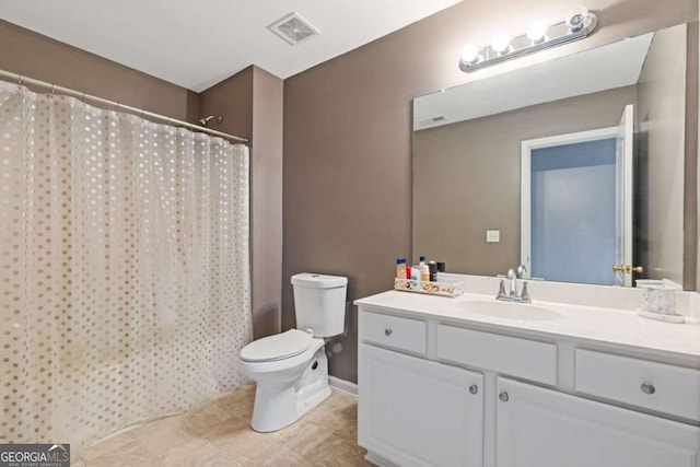 full bathroom with vanity, shower / tub combo, and toilet