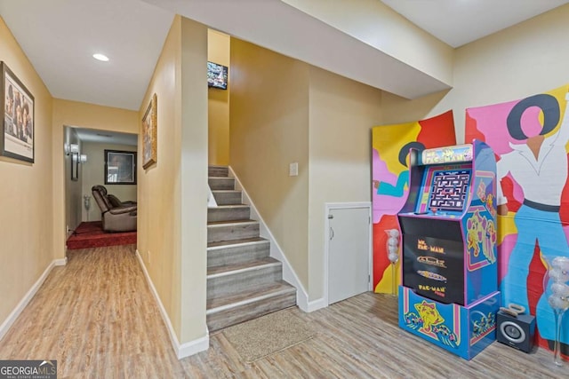 playroom featuring hardwood / wood-style floors