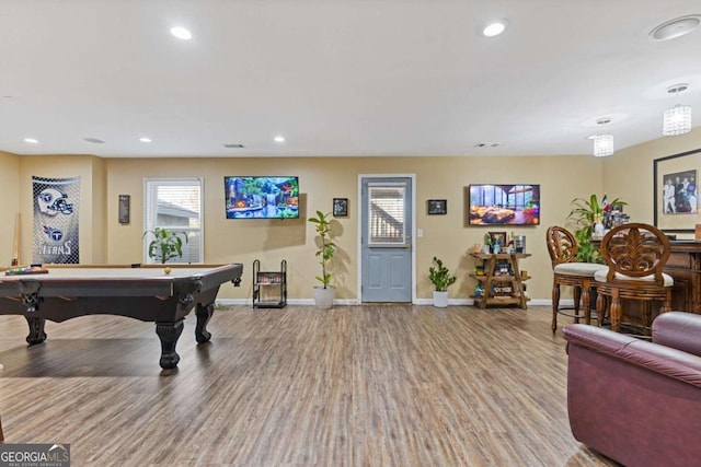 game room with billiards and light wood-type flooring