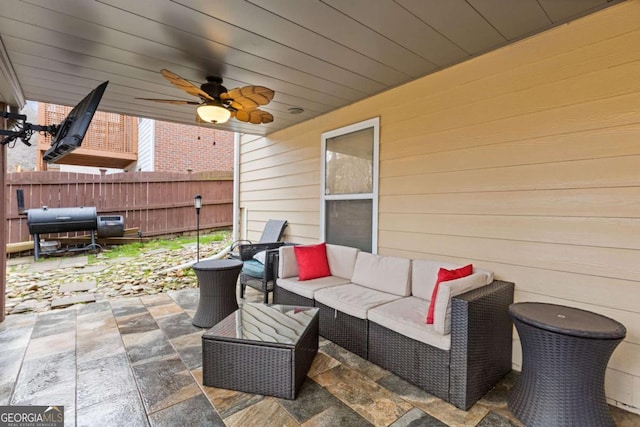 view of patio / terrace featuring grilling area, an outdoor hangout area, and ceiling fan