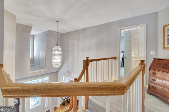 interior space with a wealth of natural light and an inviting chandelier