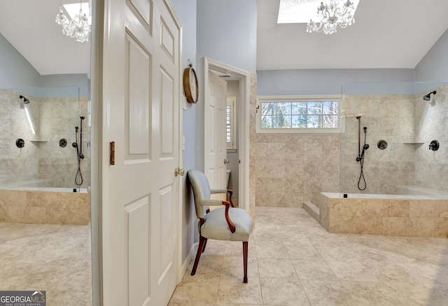 bathroom featuring tiled shower, lofted ceiling, and a notable chandelier