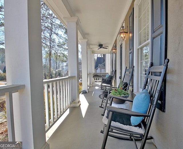 balcony featuring ceiling fan