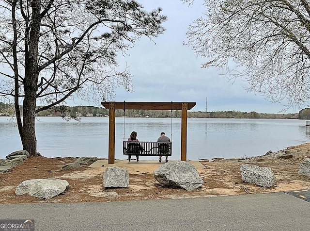 dock area featuring a water view