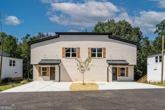 view of front of house featuring central AC unit