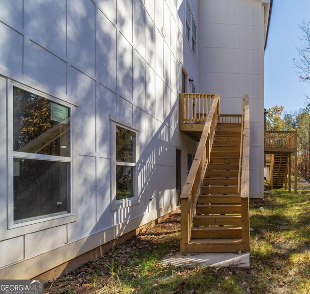 view of home's exterior featuring a wooden deck