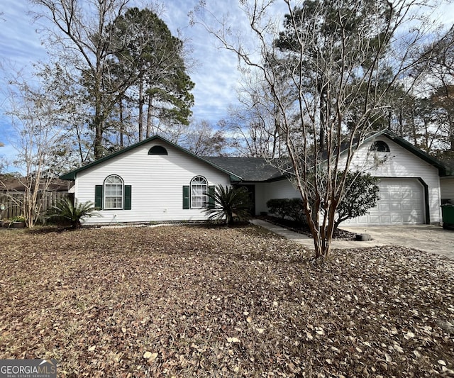 single story home with a garage