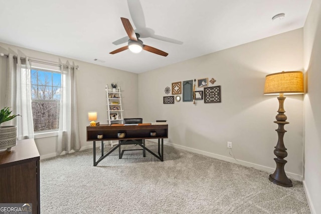 home office featuring carpet floors and ceiling fan