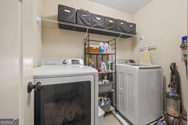 washroom with washer and clothes dryer