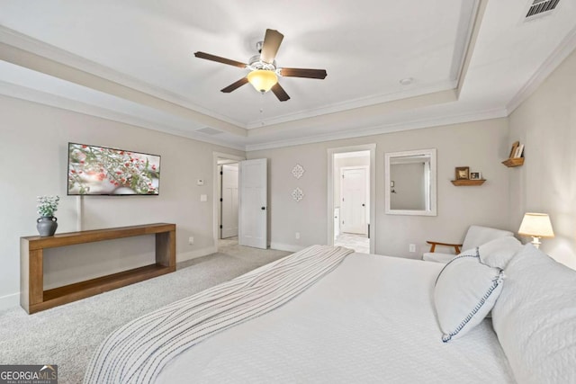 bedroom with crown molding, ceiling fan, a raised ceiling, and carpet