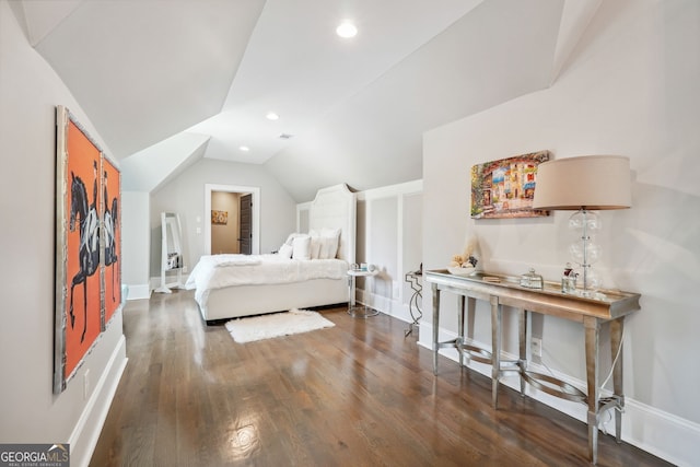 bedroom with vaulted ceiling, dark wood-type flooring, baseboards, and recessed lighting