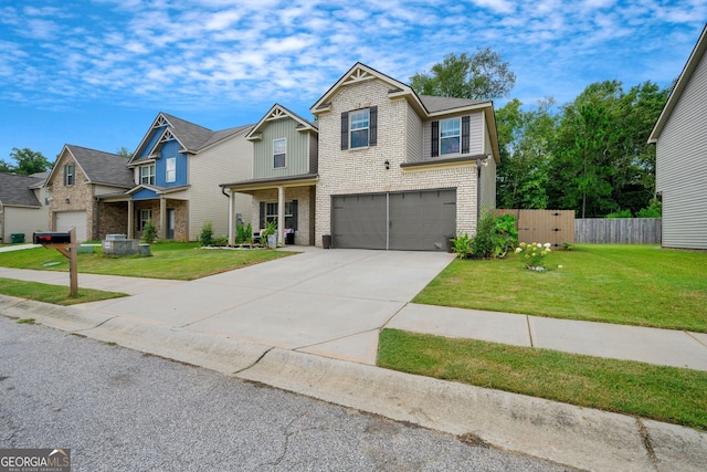 view of front of home with a garage and a front yard