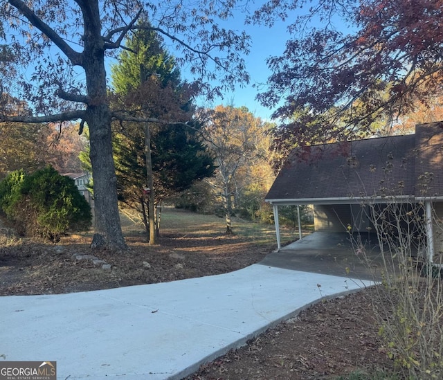 view of yard featuring a carport