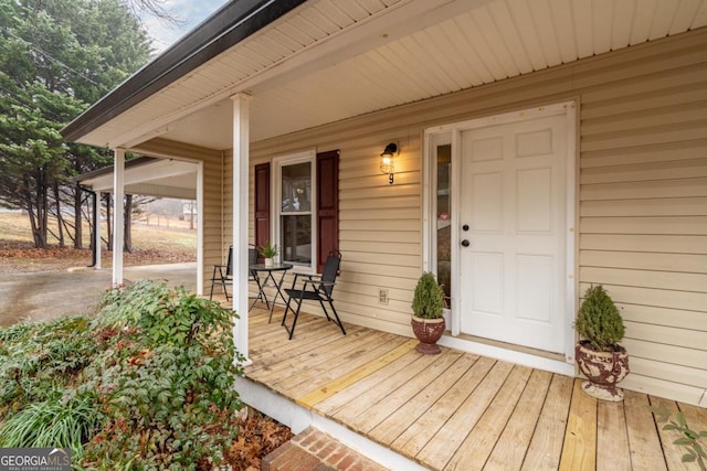 doorway to property with a porch