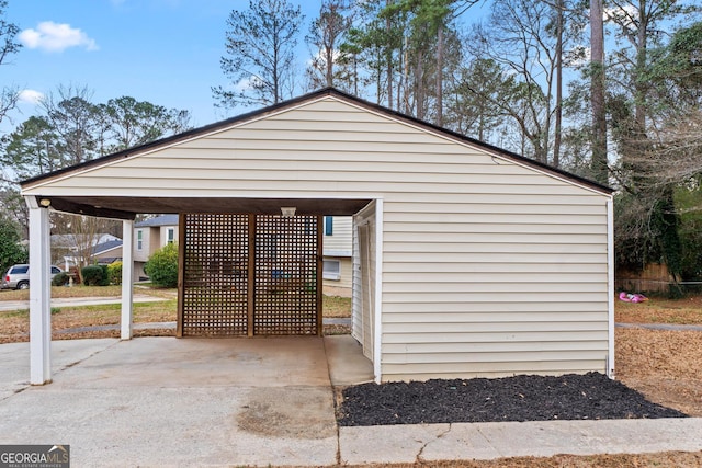 exterior space with a carport