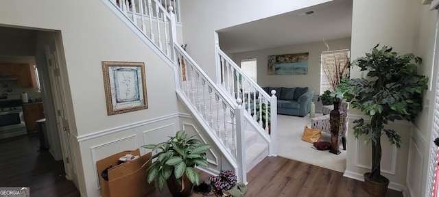 stairway with wood-type flooring