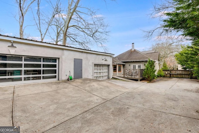 exterior space with a garage