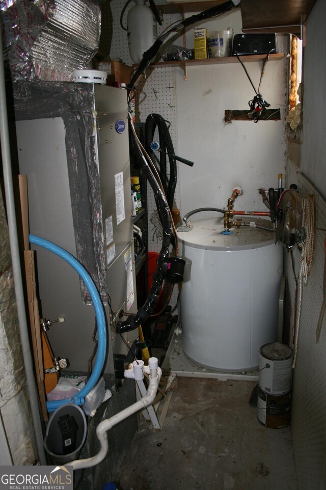 utility room featuring gas water heater